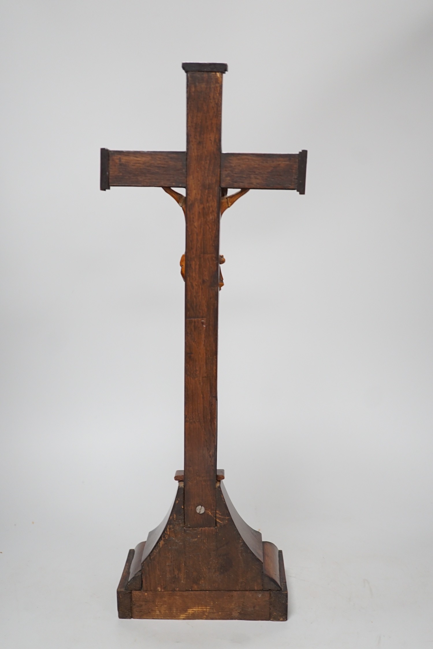 A carved wood Corpus Christi, 49cms high